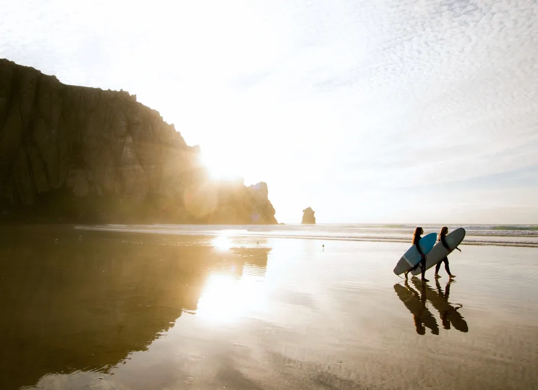 surfers on the California coast
